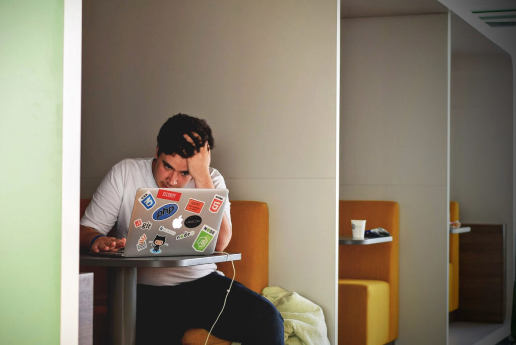 Stressed out man with computer