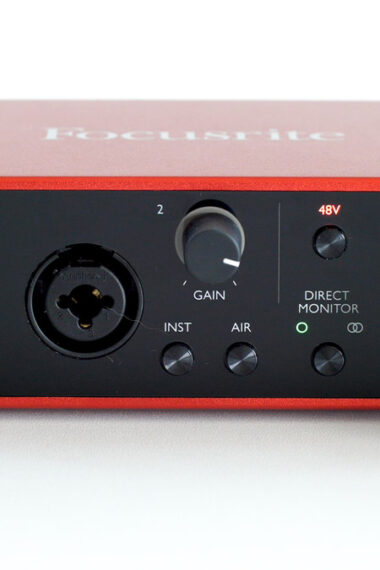 Focusrite Scarlett 2i2 with mic and headphones plugged in